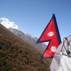 Flag Nepal with himalayan background • <a style="font-size:0.8em;" href="http://www.flickr.com/photos/62279437@N07/8886058564/" target="_blank">View on Flickr</a>